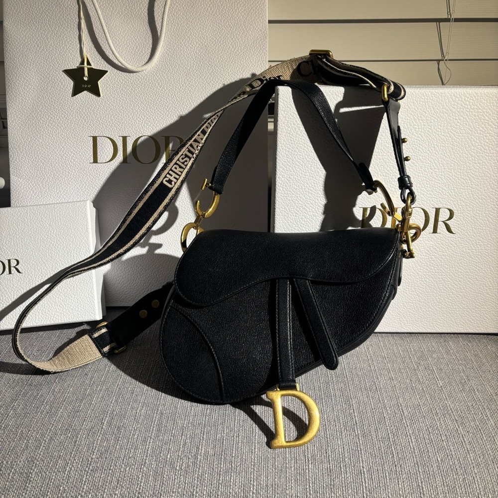 Dior black saddle bag with strap, box, and dust bag